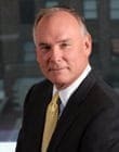 Portrait photo of Dennis M. Nally