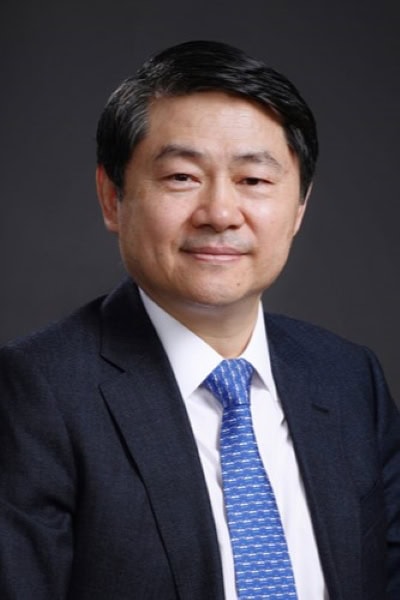 Portrait photo of Wang Huiyao